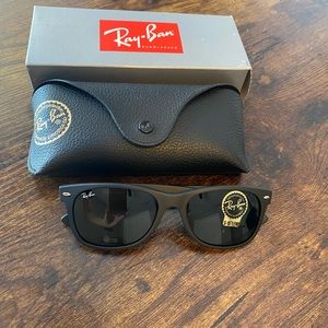 Black pair of Raybans - never worn!!